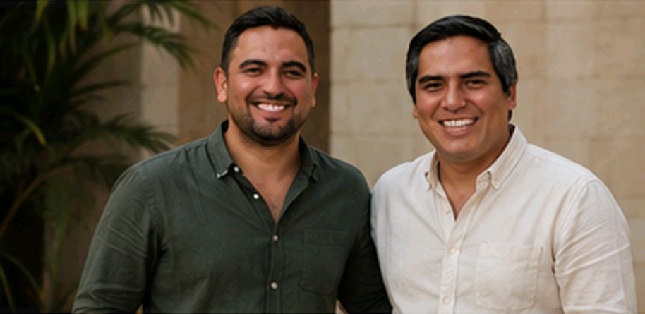 Gabriel, left, and Jose Pablo, right, founders of Inedito Experiences, standing side by side outdoors